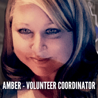 A woman with long hair and blue eyes.