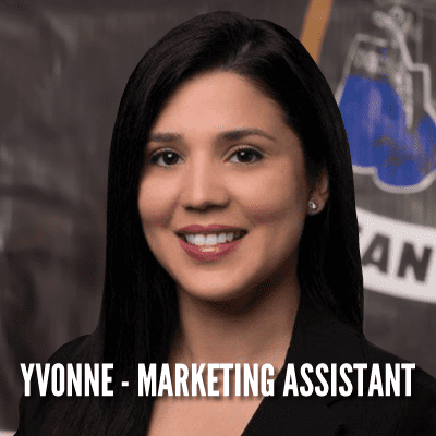 A woman in black jacket and white shirt with words.